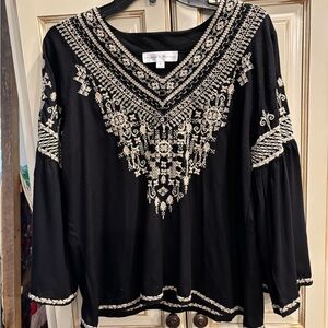Chelsea & Theodore top ladies size small black in color. Long sleeve